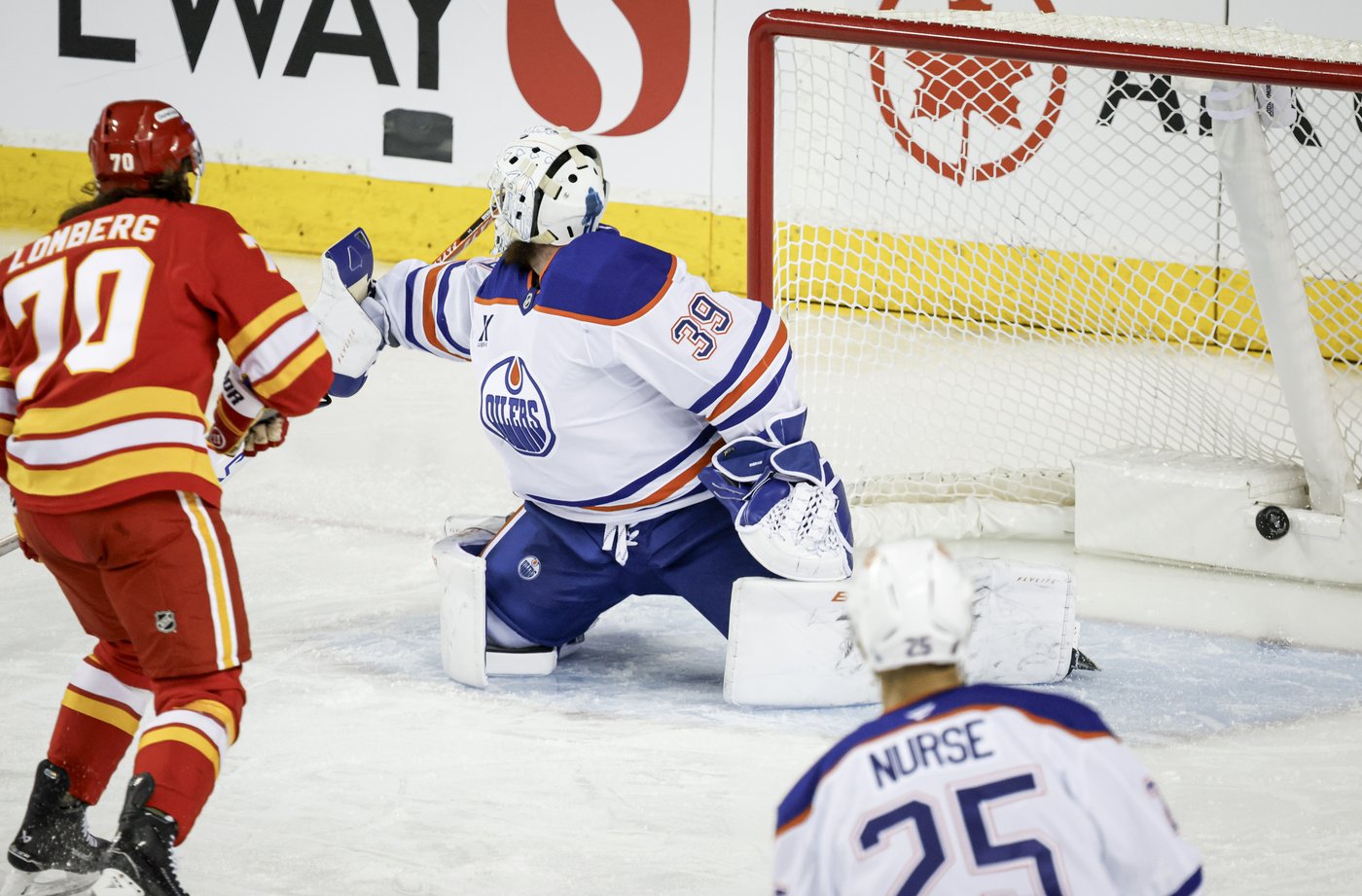 Flames remain hot at home, burn Oilers 3-2 | iNFOnews.ca