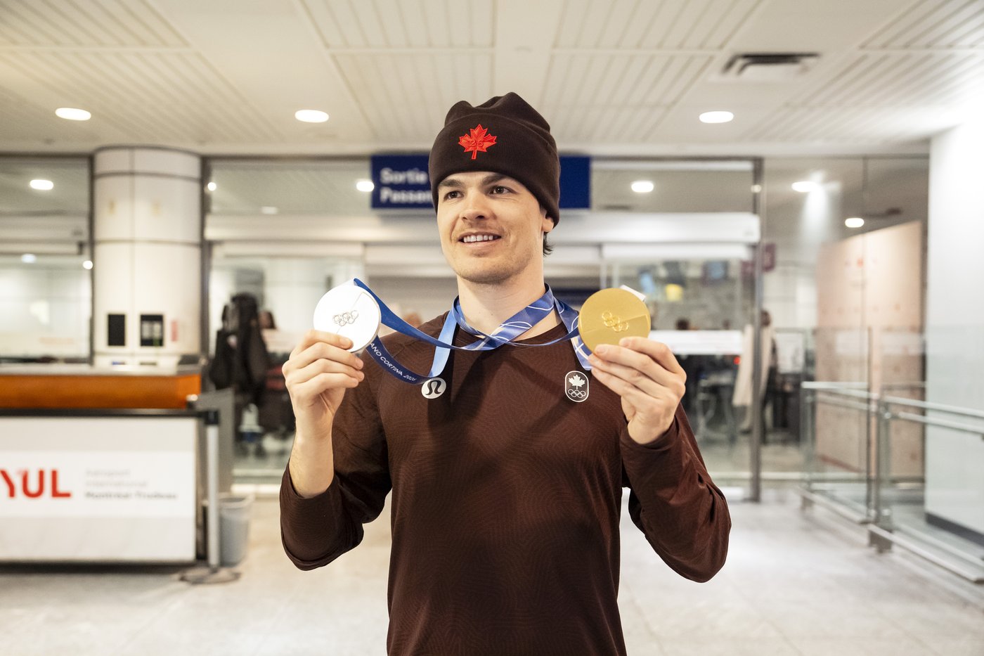 Photo Gallery: Canada's Olympians arrive home | iNFOnews.ca