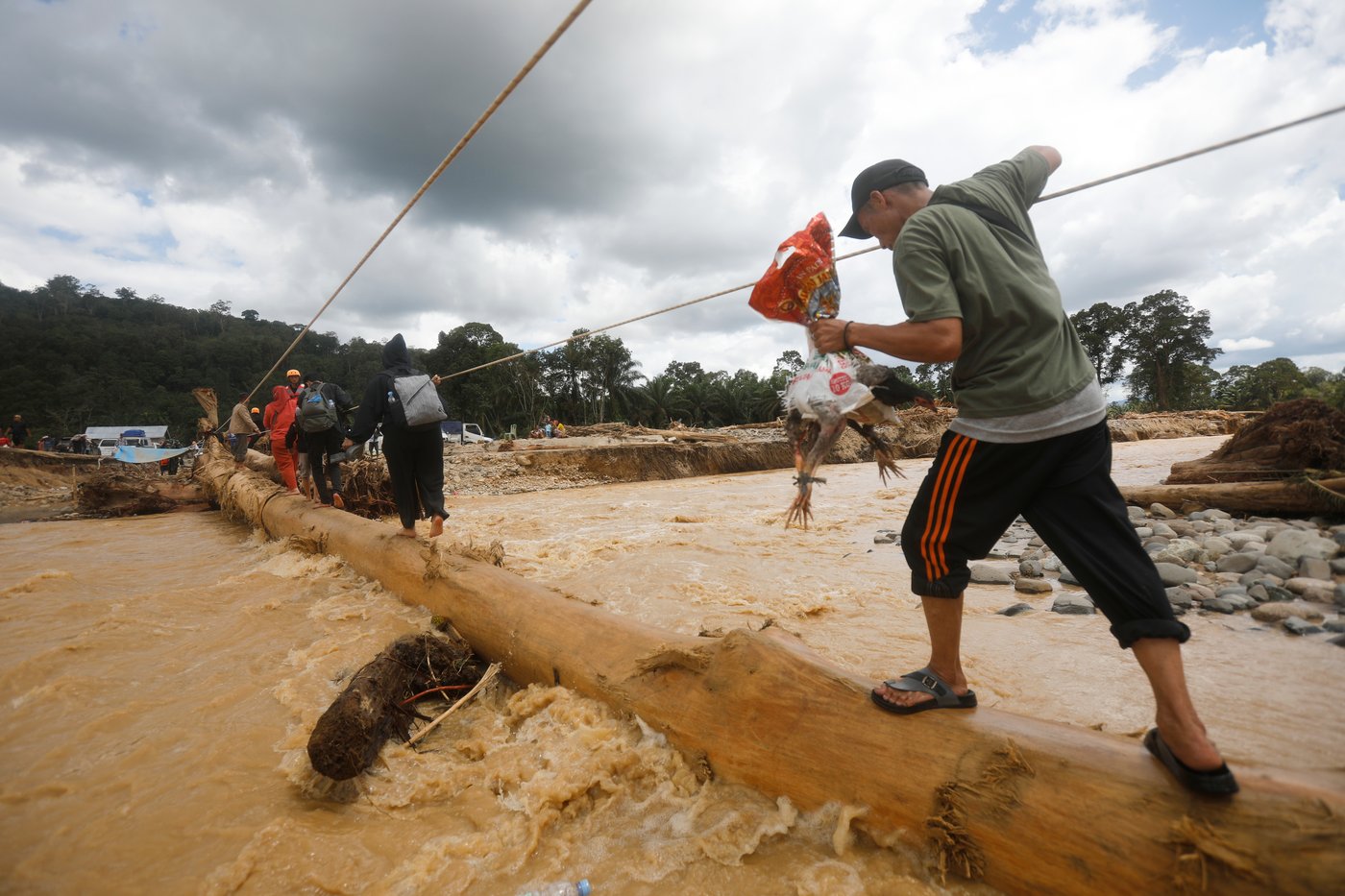 Photos show devastating floods in Indonesia, Sri Lanka and Thailand | iNFOnews.ca