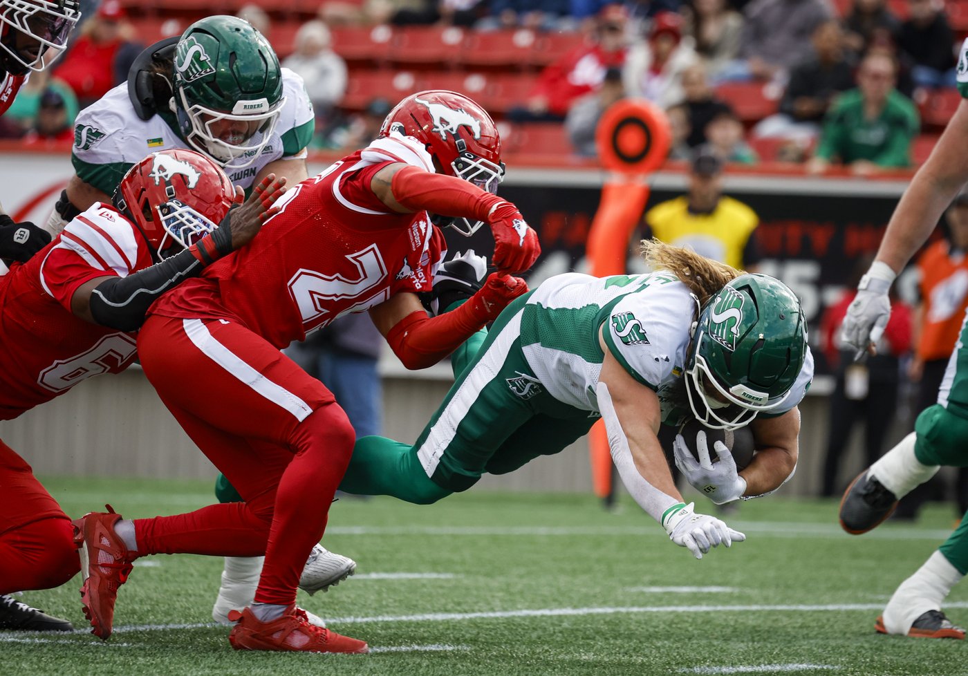 Roughriders fend off Stampeders' comeback and stiff wind at McMahon for 40-37 OT win | iNFOnews.ca Roughriders fend off Stampeders' comeback and stiff wind at McMahon for 40-37 OT win | iNFOnews.ca