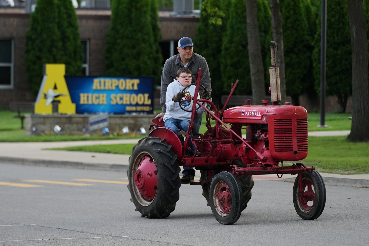 Tractors, ATVs and golf carts, oh my: Michigan seniors arrive at school in style on Tractor Day | iNFOnews.ca