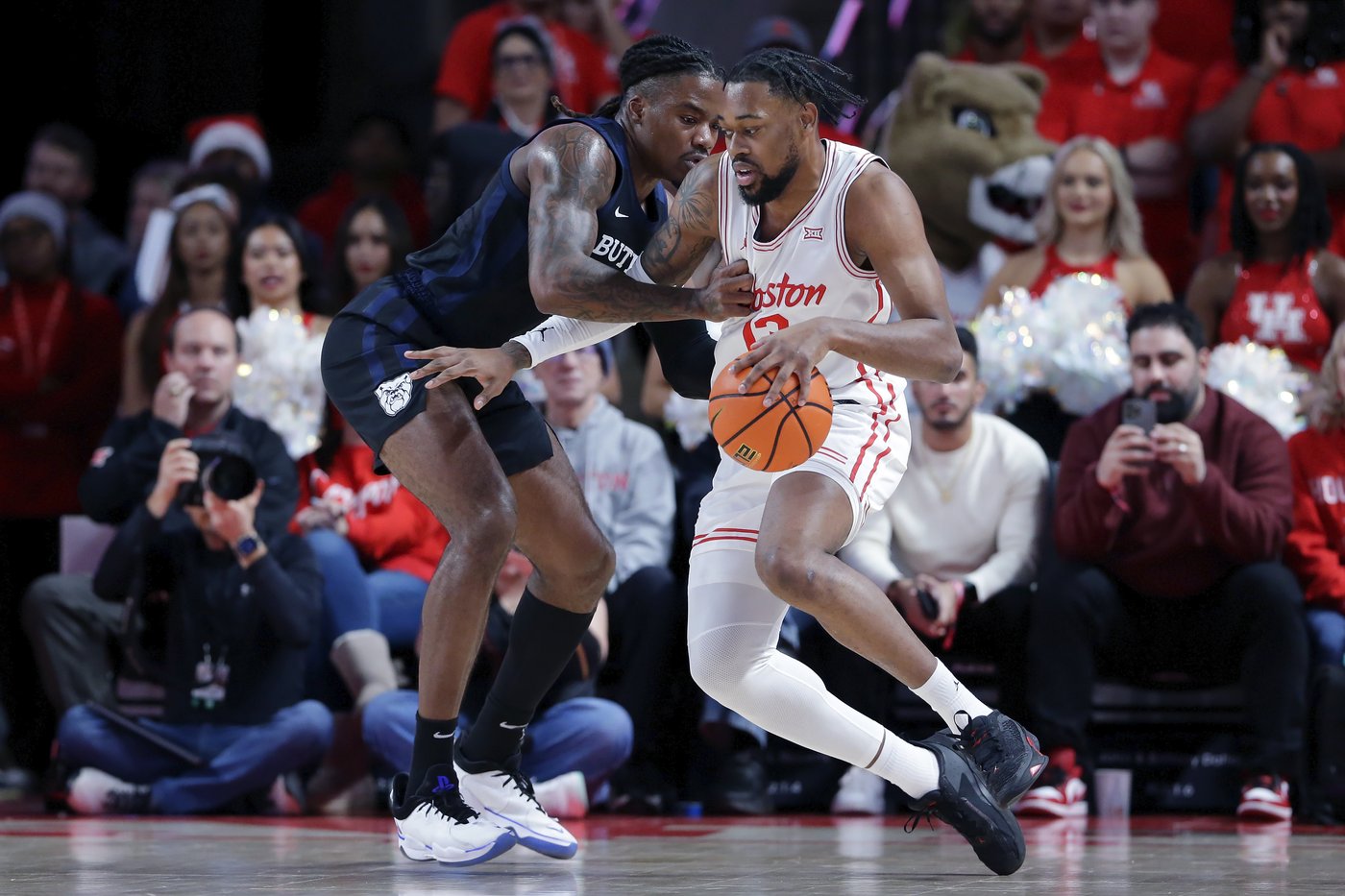 L.J. Cryer scores 18 of his 20 points in 2nd half and No. 17 Houston beats Butler 79-51 | iNFOnews.ca