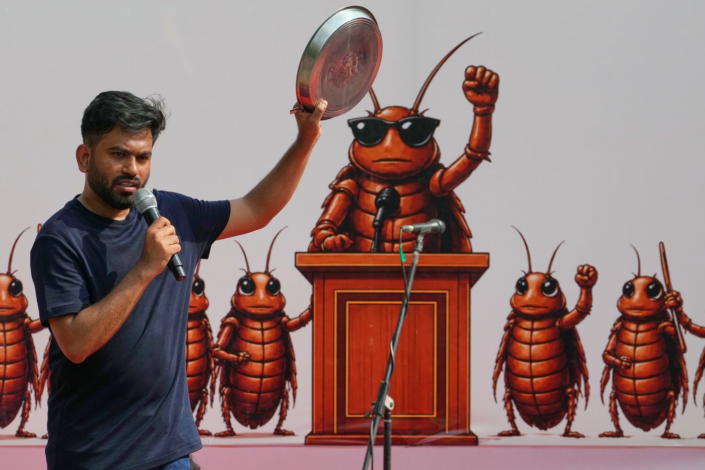 India's Cockroach Party supporters bang plates to call for education minister's resignation | iNFOnews.ca