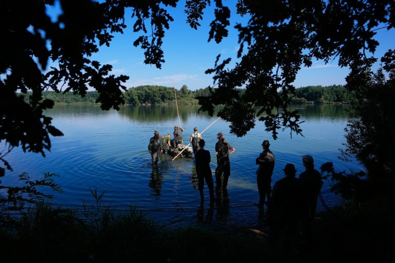 Photos show European fishers on the brink as summer drought parches rivers, lakes and farms | iNFOnews.ca