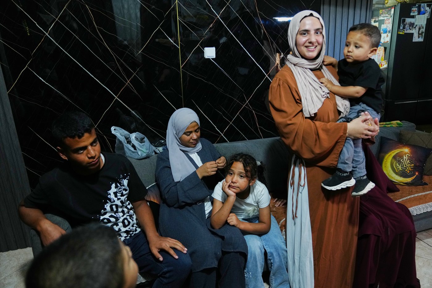 Orphaned by war in Gaza, Palestinian siblings reunite with their sister in Israel | iNFOnews.ca