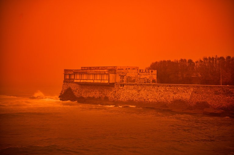 Saharan dust storm turns Greek sky red as winds and flooding leave 1 person dead | iNFOnews.ca