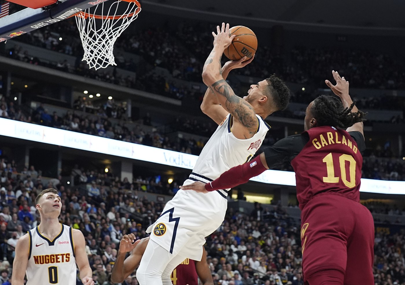 Mitchell scores 33, Cavs beat Nuggets 149-135 for 6th straight win | iNFOnews.ca