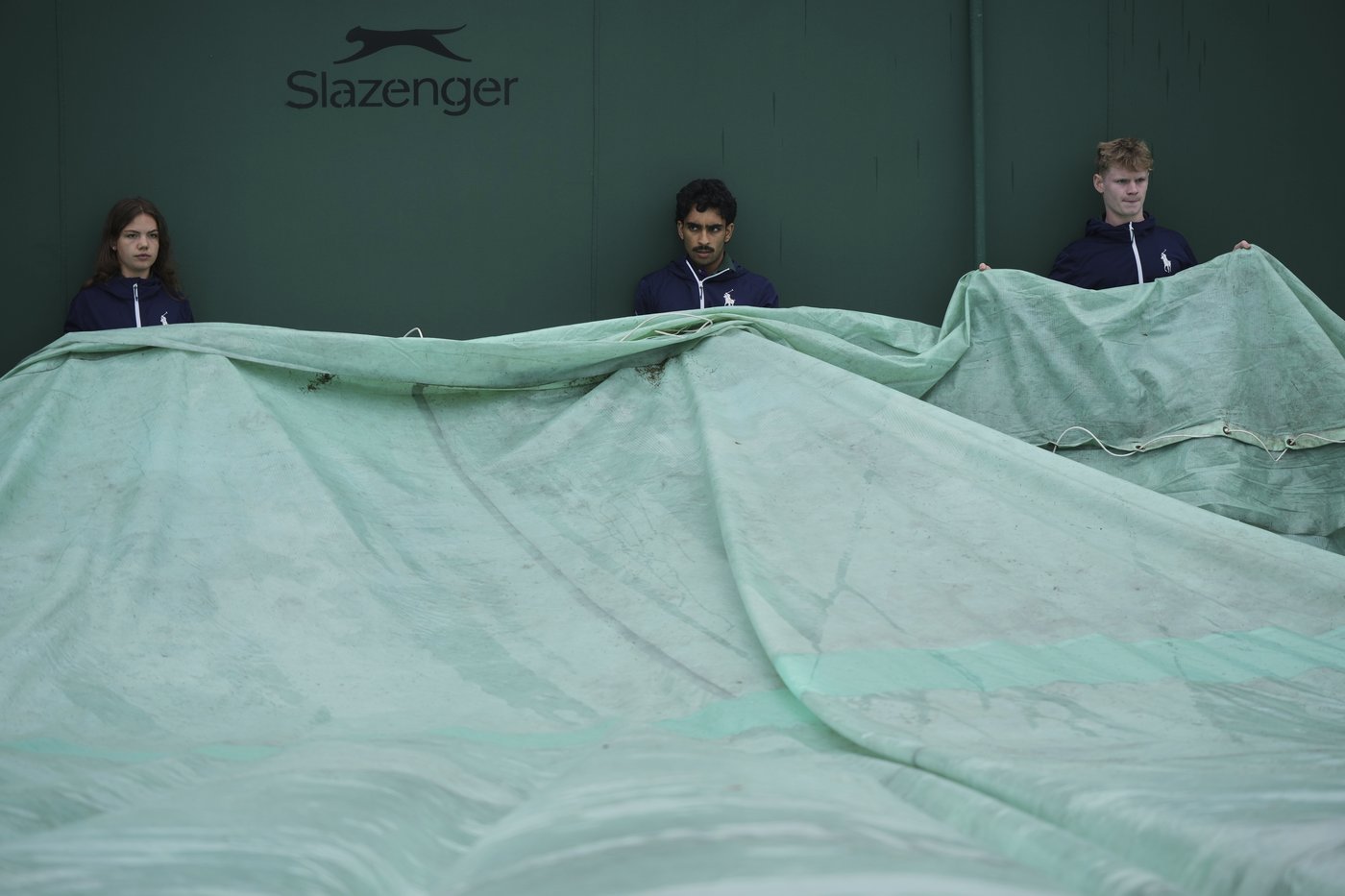 Photos show the rain on Day 3 after the Wimbledon heatwave | iNFOnews.ca