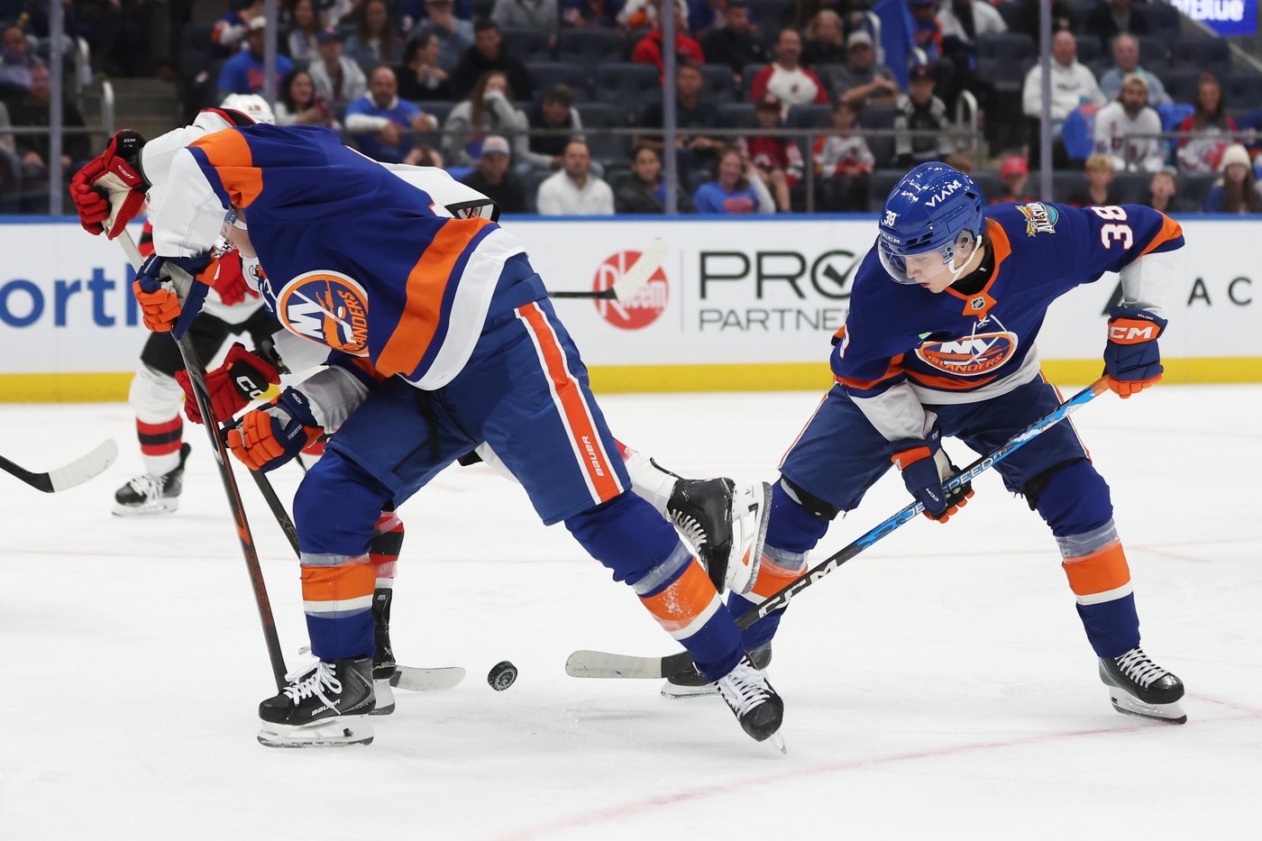 Victor Eklund controls the puck for the Islanders against the Devils on October 3, 2026