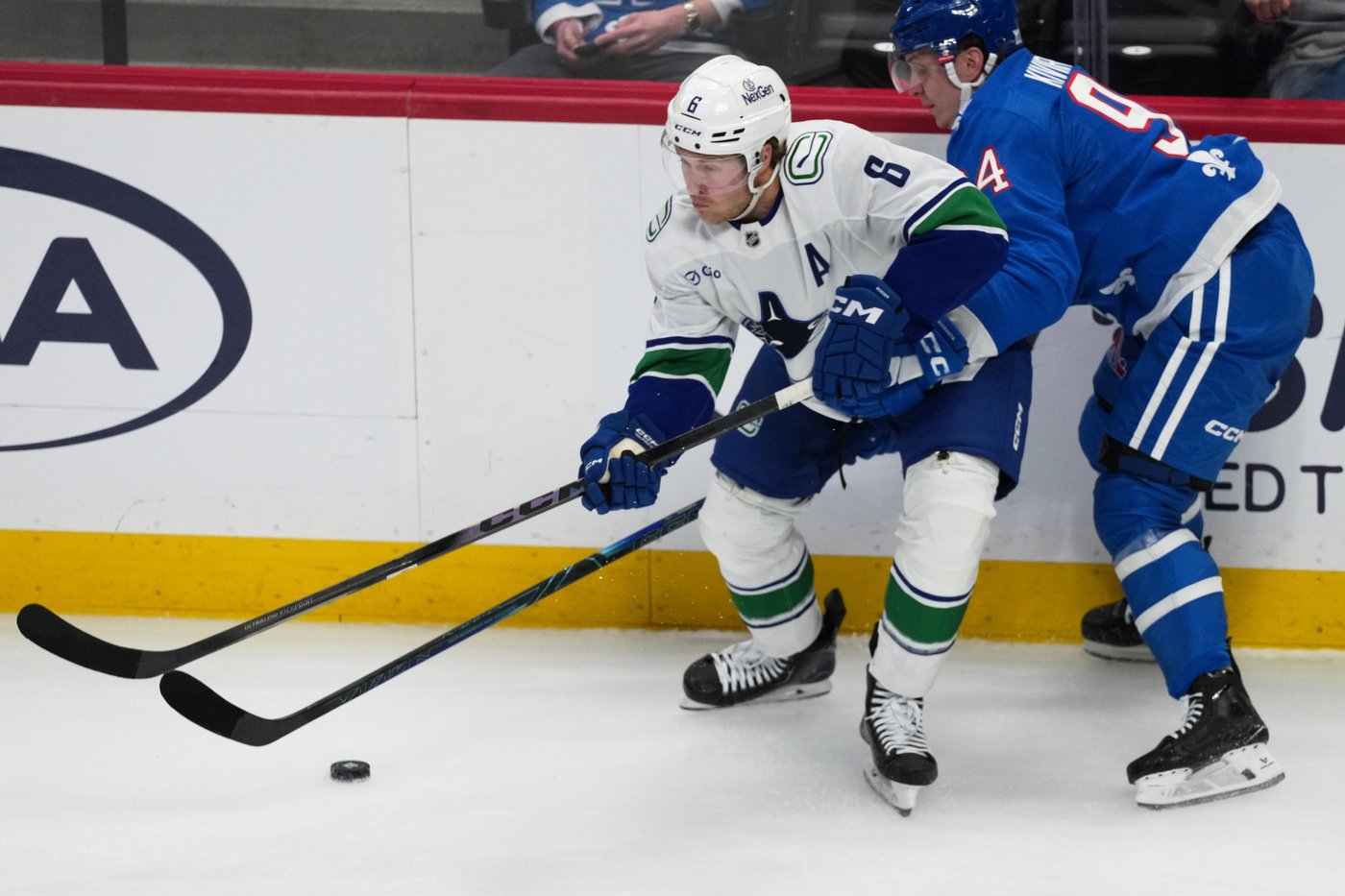 Boeser has hat trick, last-place Canucks overcome blowing 4-goal lead to beat NHL-leading Avs 8-6 | iNFOnews.ca