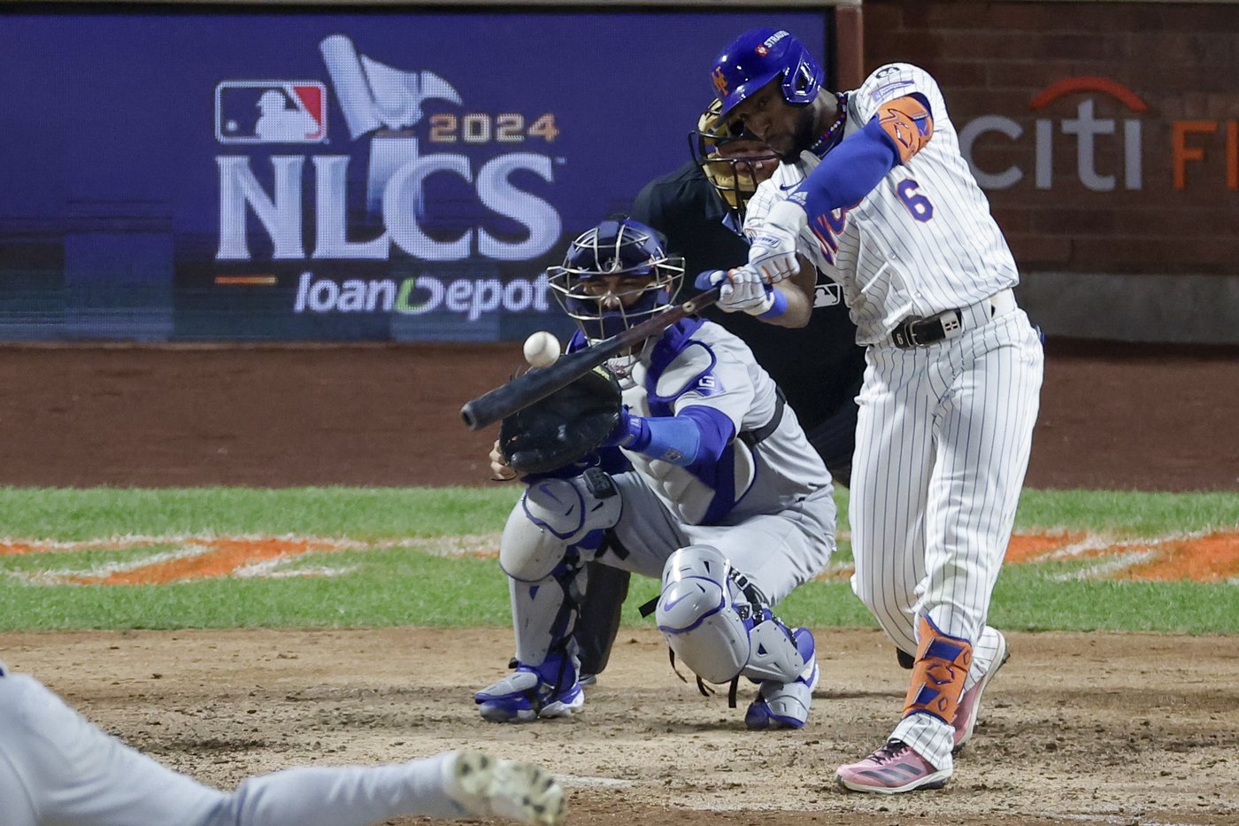 Starling Marte wears necklace from fan, gets his 4th hit in Mets' NLCS win over Dodgers | iNFOnews.ca