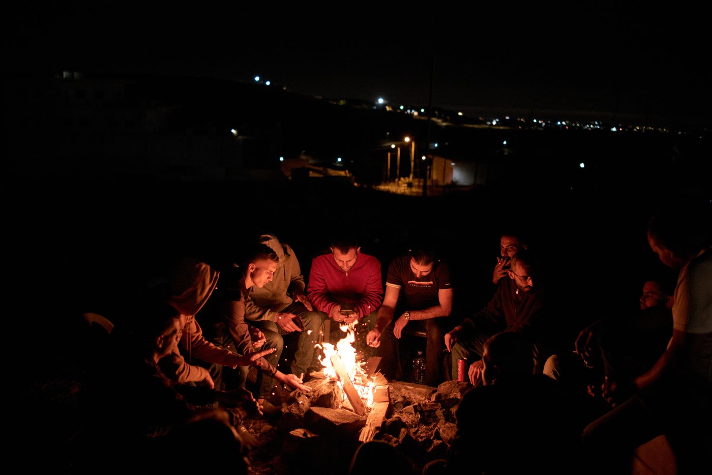Photos show West Bank Palestinians keeping watch at night as settler violence grows | iNFOnews.ca