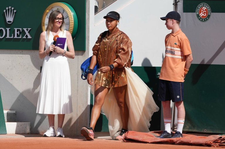 Osaka adds an ivory train and gold bomber jacket to her fashion ensemble at the French Open | iNFOnews.ca