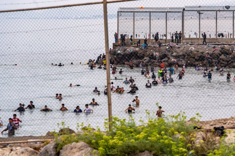 Runaway online rumors sparked frantic rush by migrants to the Spanish enclave of Ceuta | iNFOnews.ca