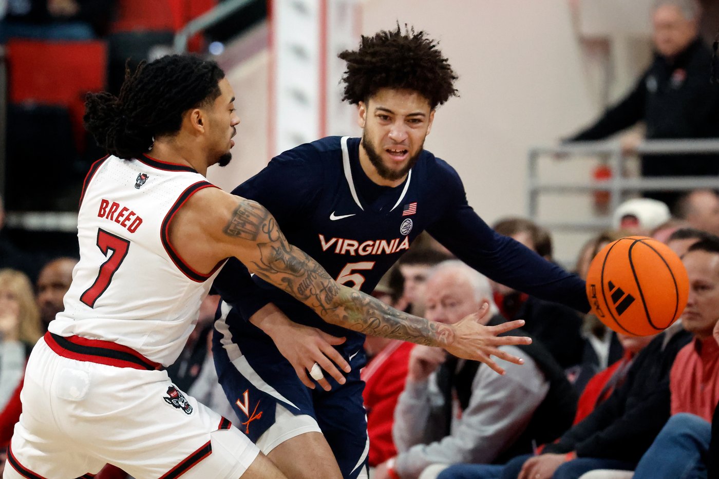 Lewis, De Ridder help No. 21 Virginia regroup from 3OT loss to beat NC State 76-61 | iNFOnews.ca Lewis, De Ridder help No. 21 Virginia regroup from 3OT loss to beat NC State 76-61 | iNFOnews.ca