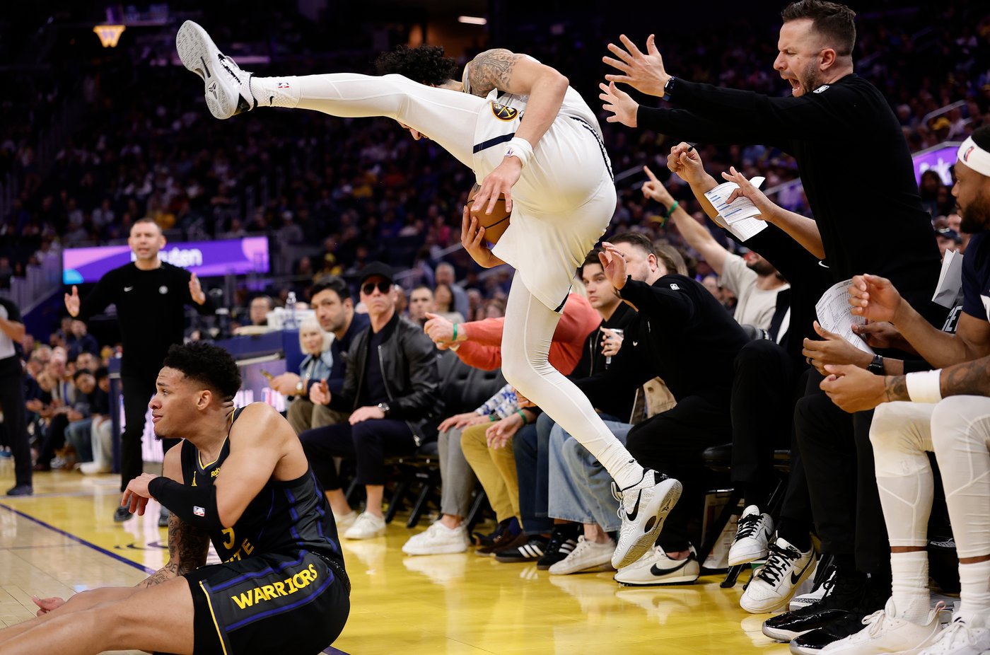 Podziemski's late scoring leads Warriors to a 128-117 win over the Nuggets | iNFOnews.ca