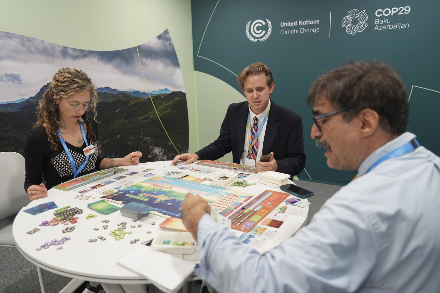 In a board game, climate experts work to save the world, which diplomats at COP29 try in real life | iNFOnews.ca