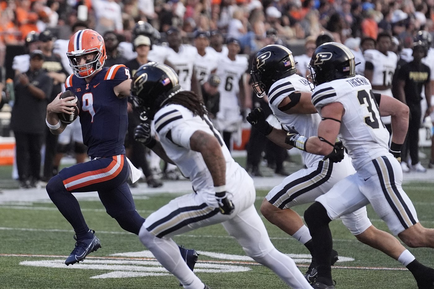 No. 23 Illinois outlasts Purdue 50-49 in overtime on sack on 2-point conversion | iNFOnews.ca No. 23 Illinois outlasts Purdue 50-49 in overtime on sack on 2-point conversion | iNFOnews.ca