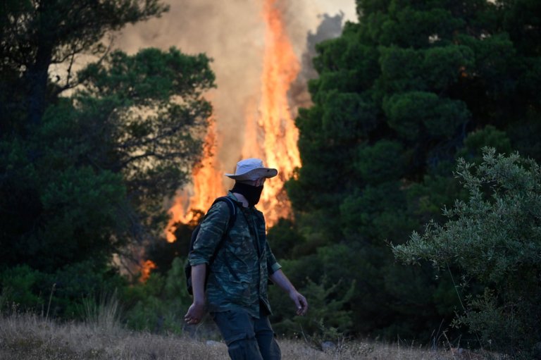 Photos show destruction from wildfires in Greece as blazes take hold in Europe and parts of the US | iNFOnews.ca