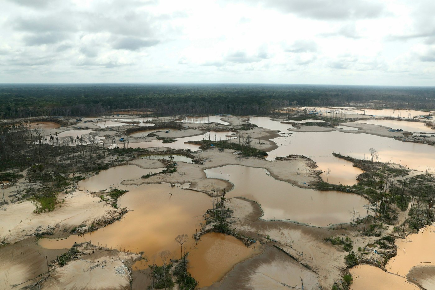 Illegal gold mining surges into new parts of Peru’s Amazon, threatening rivers and lives | iNFOnews.ca