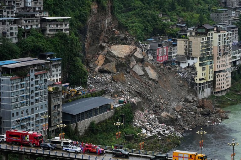 Rescuers race to find survivors in the rain after a landslide in China kills at least 8 | iNFOnews.ca