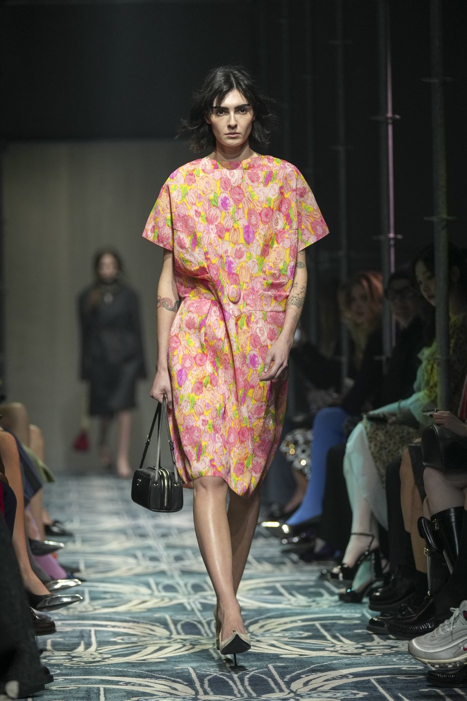 Prada reconstructs femininity starting with the little black dress fit to dark times | iNFOnews.ca