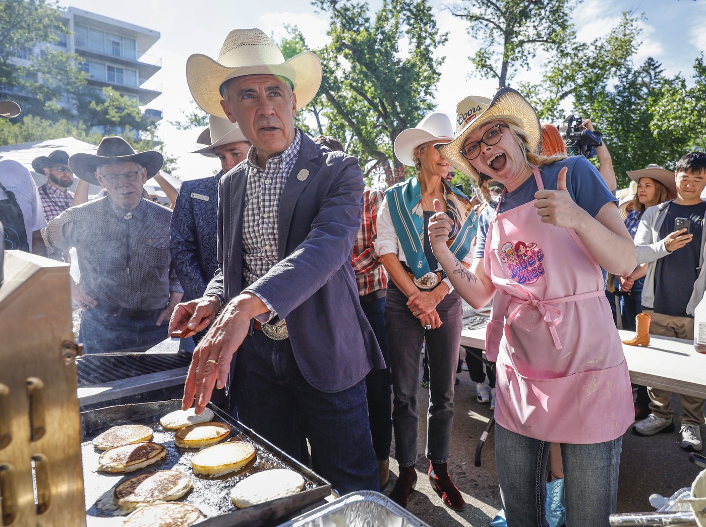 Carney perfects flipping Stampede flapjacks as separatists host similar breakfast | iNFOnews.ca Carney perfects flipping Stampede flapjacks as separatists host similar breakfast | iNFOnews.ca