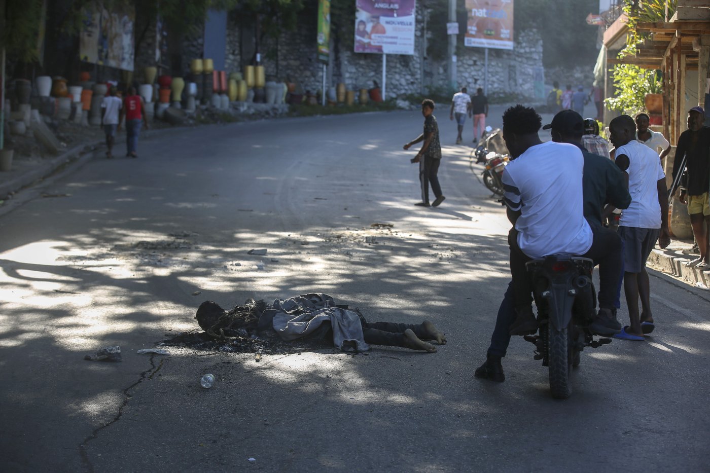 Residents in Haiti's capital stand with police in a battle to repel the latest gang attack | iNFOnews.ca Residents in Haiti's capital stand with police in a battle to repel the latest gang attack | iNFOnews.ca