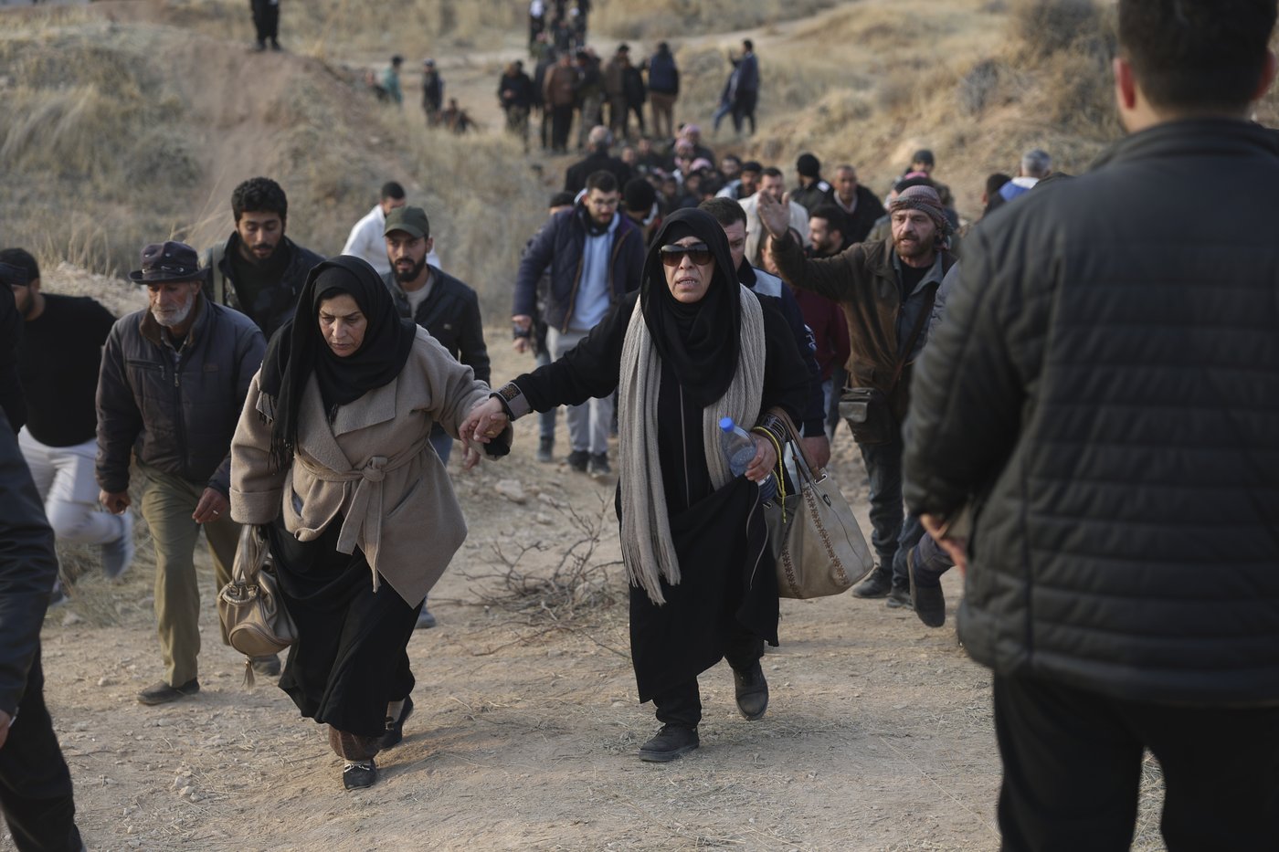 One week into a new Syria, rebels aim for normalcy and Syrians vow not to be silent again | iNFOnews.ca
