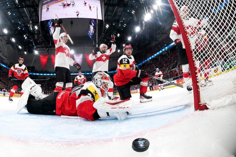 Switzerland routs Austria 9-0 to stay perfect at ice hockey worlds, US faces Germany | iNFOnews.ca