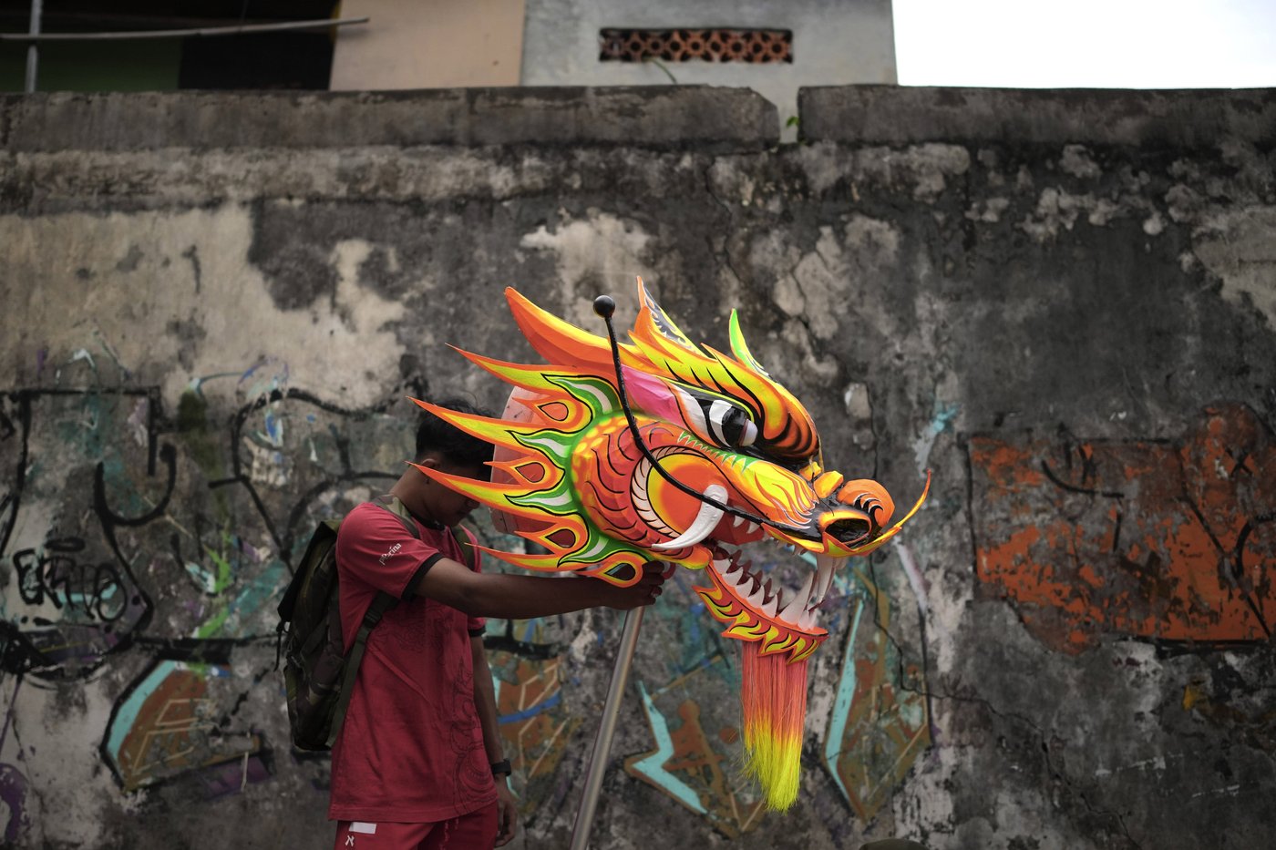 AP PHOTOS: Indonesia welcomes the Year of the Snake with dragon puppets and drum displays | iNFOnews.ca