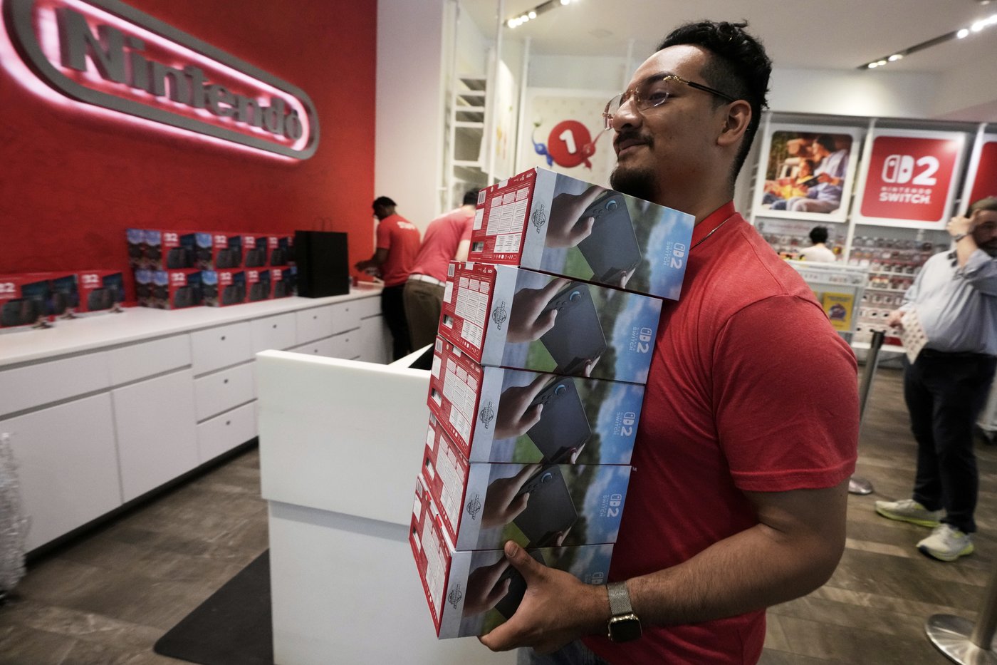 Fans around the world queue up in long lines for the highly anticipated Nintendo Switch 2 launch | iNFOnews.ca