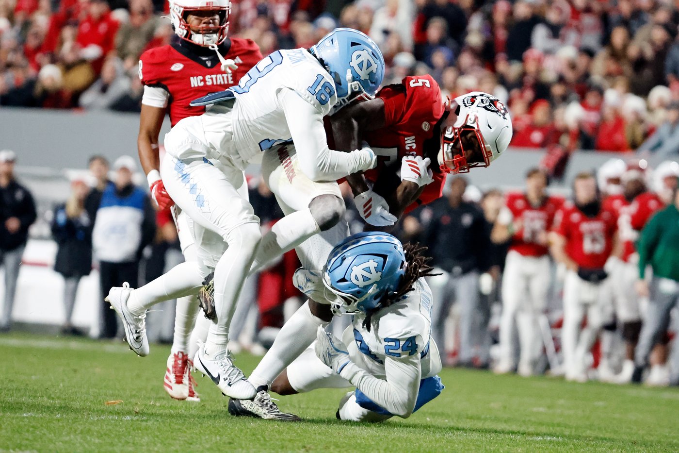 Wilson runs for 4 TDs as NC State beats UNC 42-19, winning rivalry game for 5th straight year | iNFOnews.ca
