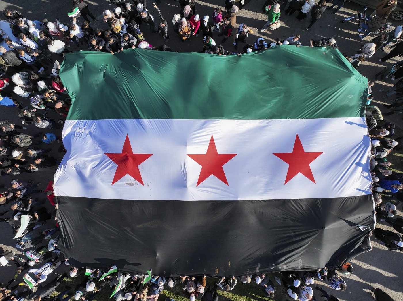 New Syria's 1st week: Rebels try to bring normalcy while Syrians vow to speak up | iNFOnews.ca New Syria's 1st week: Rebels try to bring normalcy while Syrians vow to speak up | iNFOnews.ca