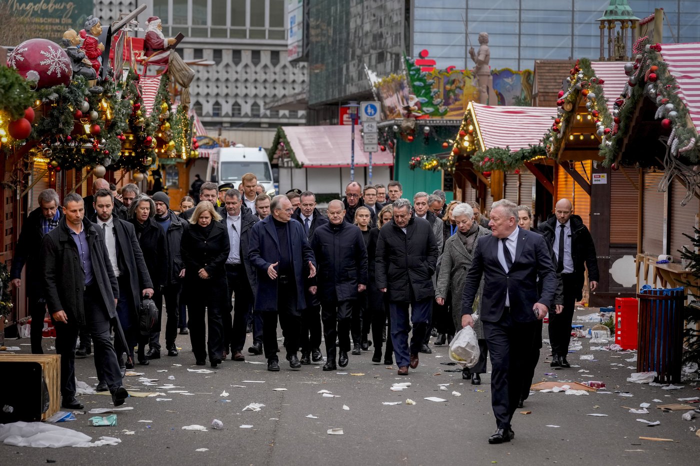 Germans mourn the 5 killed and 200 injured in the apparent attack on a Christmas market | iNFOnews.ca