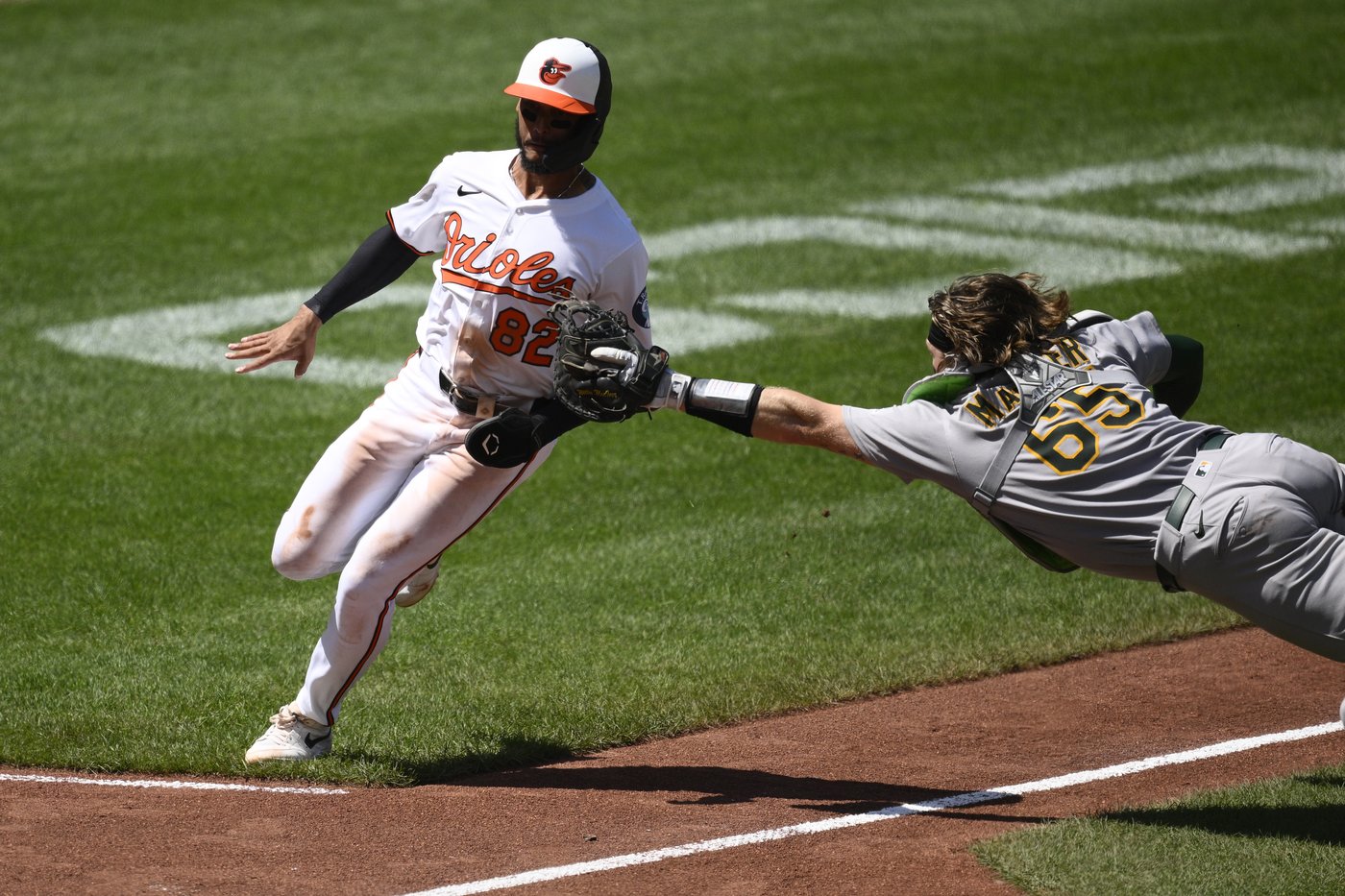 Willie MacIver hits a 2-run double in the 9th to rally Athletics over Orioles | iNFOnews.ca