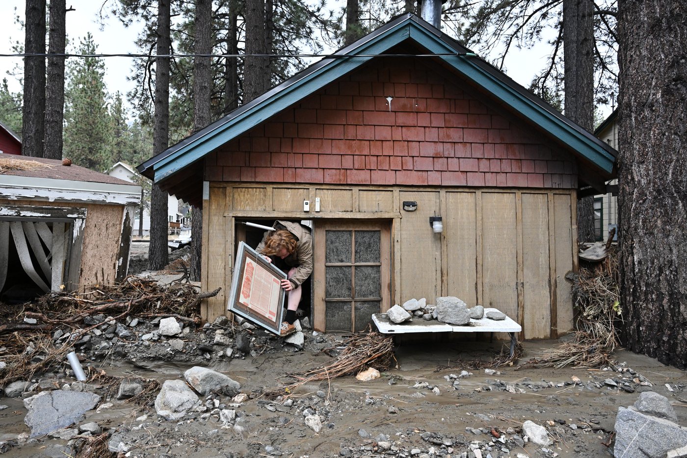 Photos show California homes buried in mud and debris during Christmas storms | iNFOnews.ca