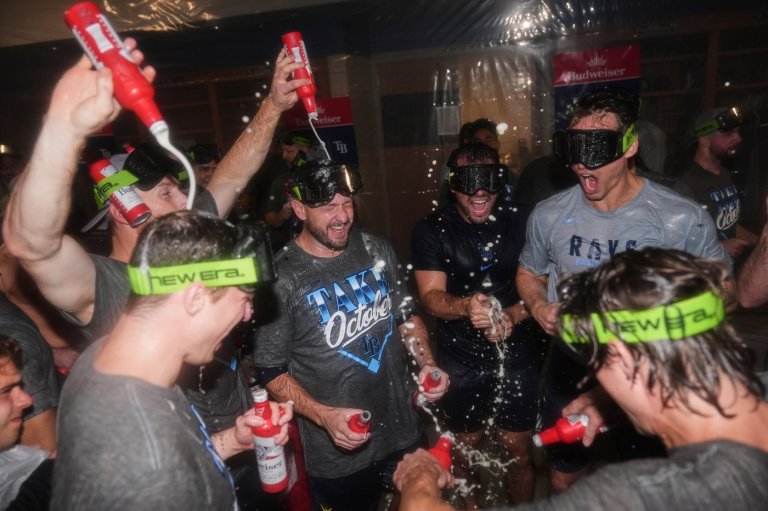 Singing `New York, New York,' Rays revel in recognition as they head to AL Championship Series | iNFOnews.ca