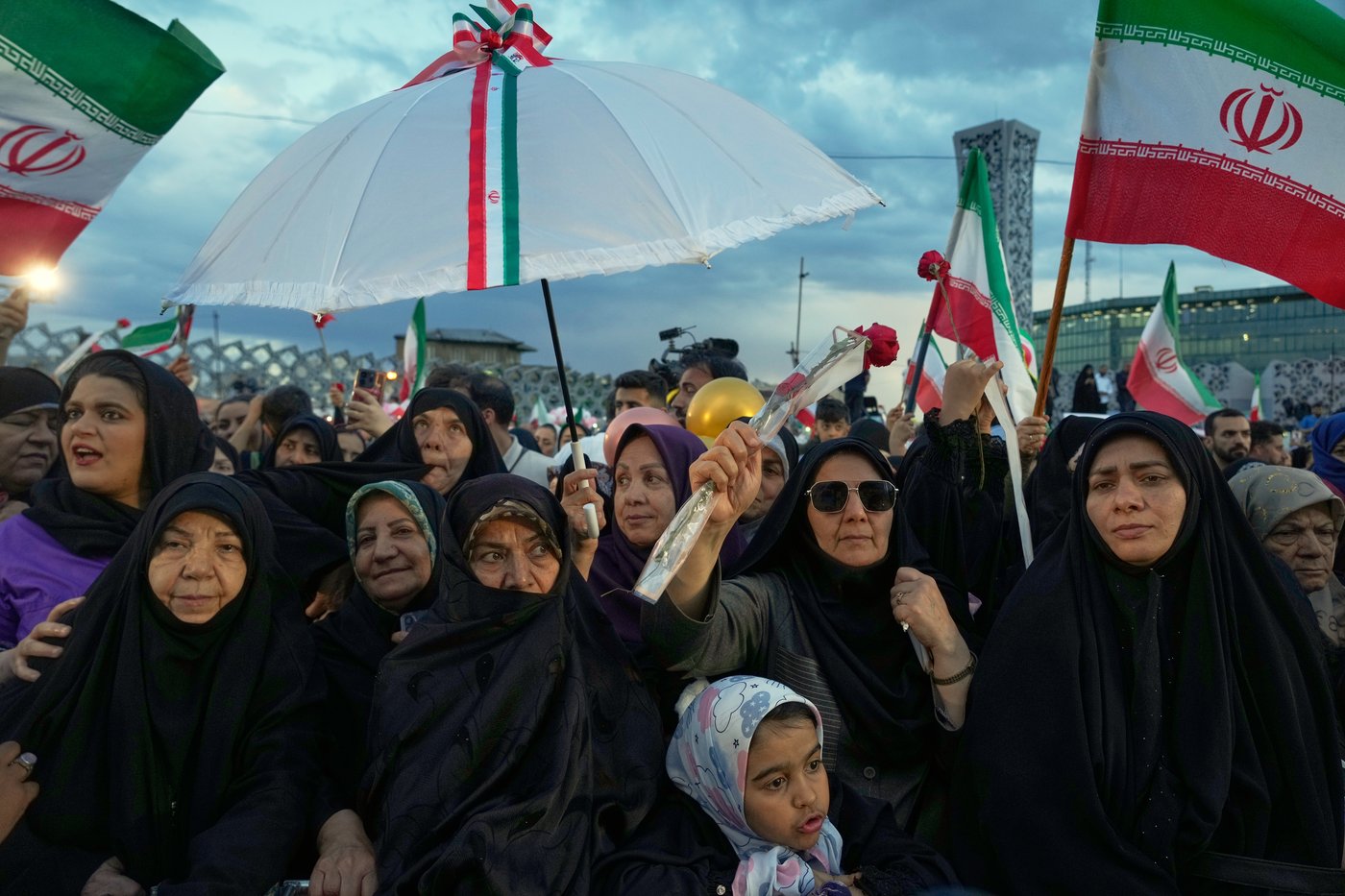 Photos of a mass wedding and a colorful missile at Tehran's 'Sacrifice for Iran' ceremony | iNFOnews.ca