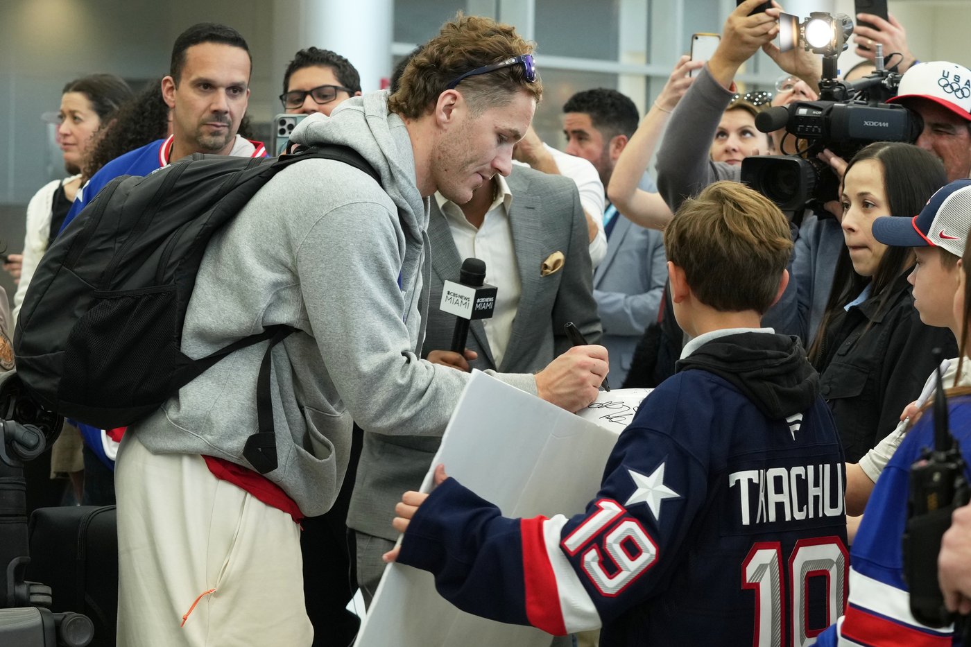 Matthew Tkachuk and Auston Matthews celebrate US hockey gold with ceremonial puck drop | iNFOnews.ca