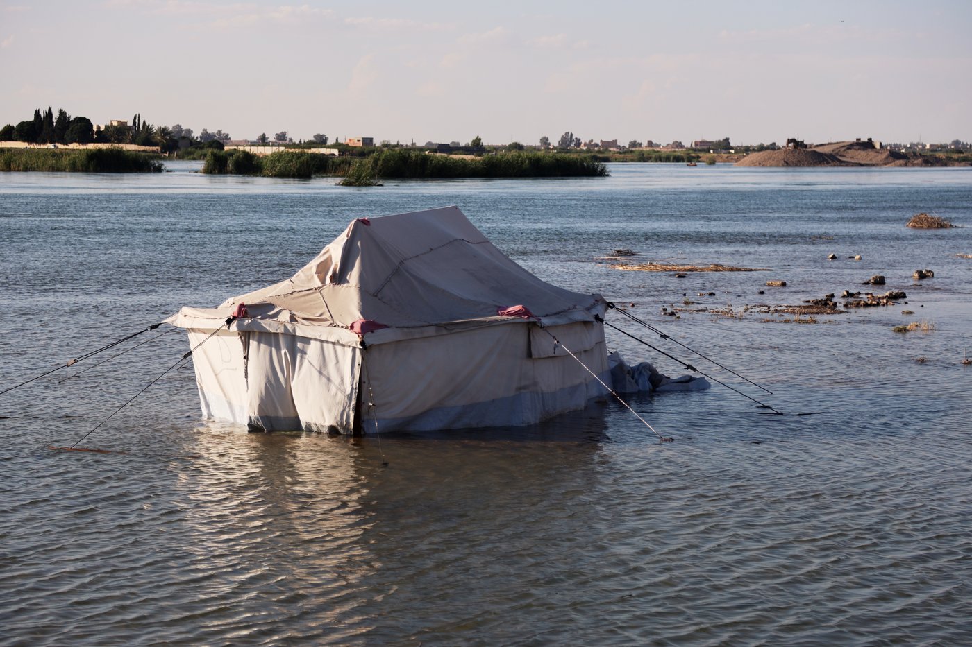 Photos of rare Euphrates River flooding forcing Syrians inland | iNFOnews.ca