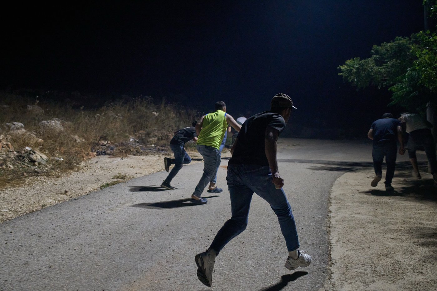 Photos show West Bank Palestinians keeping watch at night as settler violence grows | iNFOnews.ca
