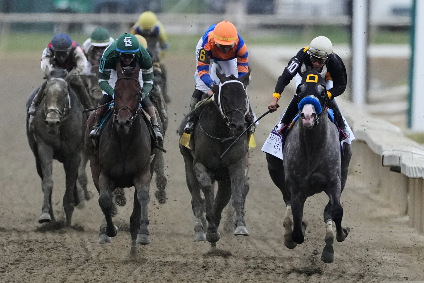 Napoleon Solo holds off Iron Honor by 1 1/4 lengths to win the Preakness at Laurel Park | iNFOnews.ca