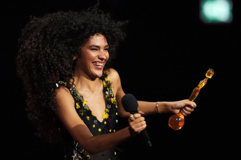 Olivia Dean wins 4 Brit Awards, taking artist of the year and song of the year | iNFOnews.ca