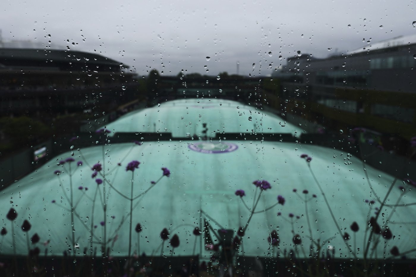 Photos show the rain on Day 3 after the Wimbledon heatwave | iNFOnews.ca