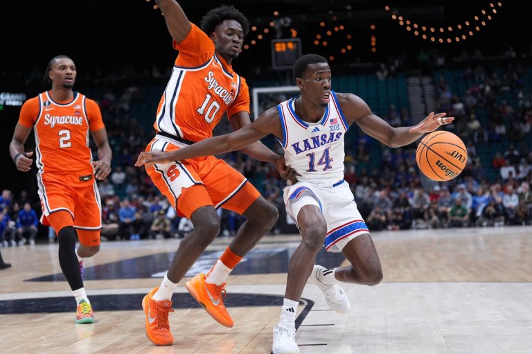 Double-doubles by Tre White and Flory Bidunga help Kansas beat Syracuse 71-60 at Players Era tourney | iNFOnews.ca
