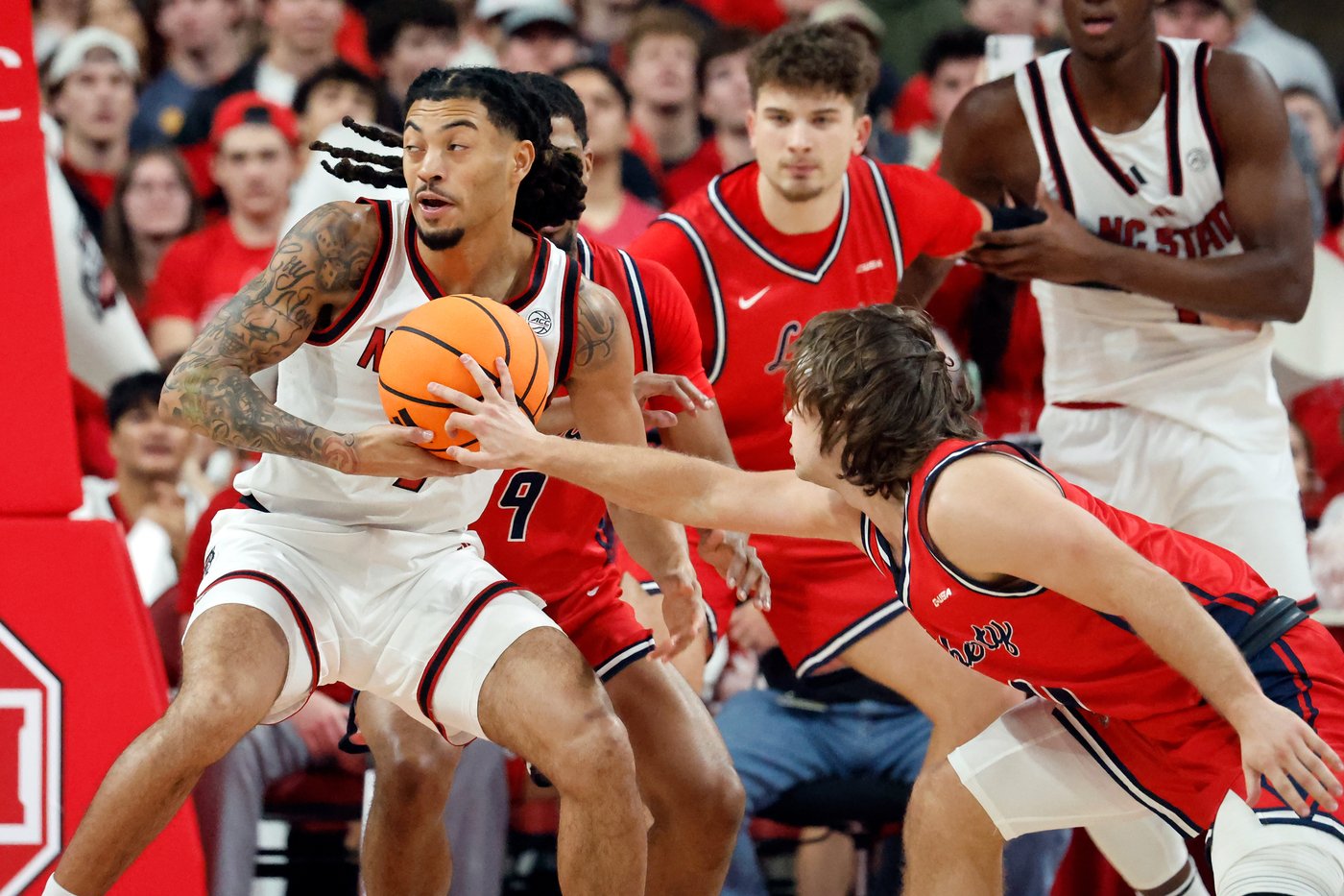 Lubin and Able score 13 points apiece to help N.C. State rout Liberty 85-45 | iNFOnews.ca