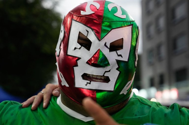 Masked wrestlers flood Mexico’s World Cup streets as fans embrace lucha libre fever | iNFOnews.ca