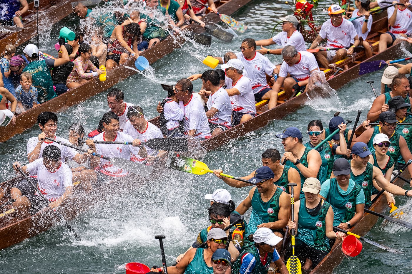 Competitors take part in boat races to mark the Dragon Boat Festival, in photos | iNFOnews.ca