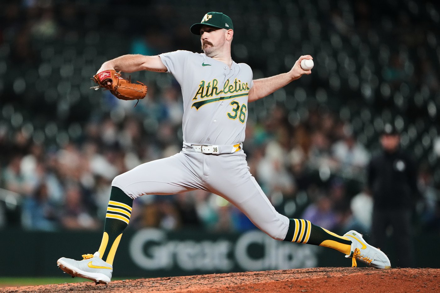Butler drives in go-ahead run, A's pitchers combine for 18 strikeouts in 7-4 win over Mariners | iNFOnews.ca